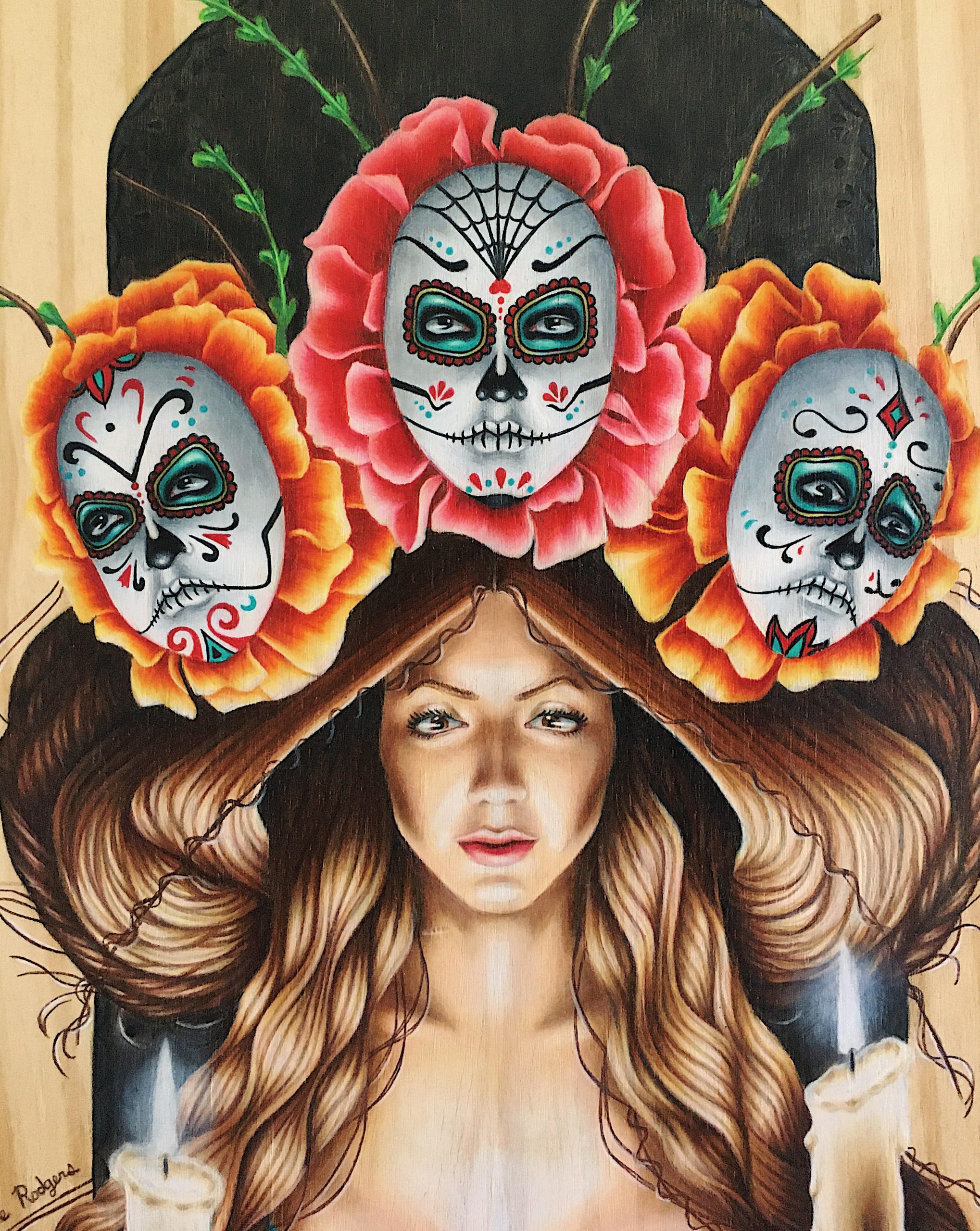 Woman with long wavy hair surrounded by colorful Day of the Dead skull flowers in pink and orange on black background