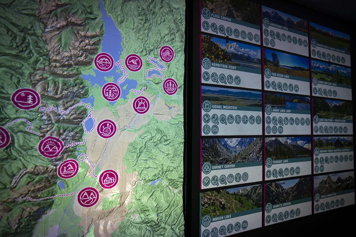 3 full-map Interactive trail map display showing hiking locations with purple icons and detailed trail information panels