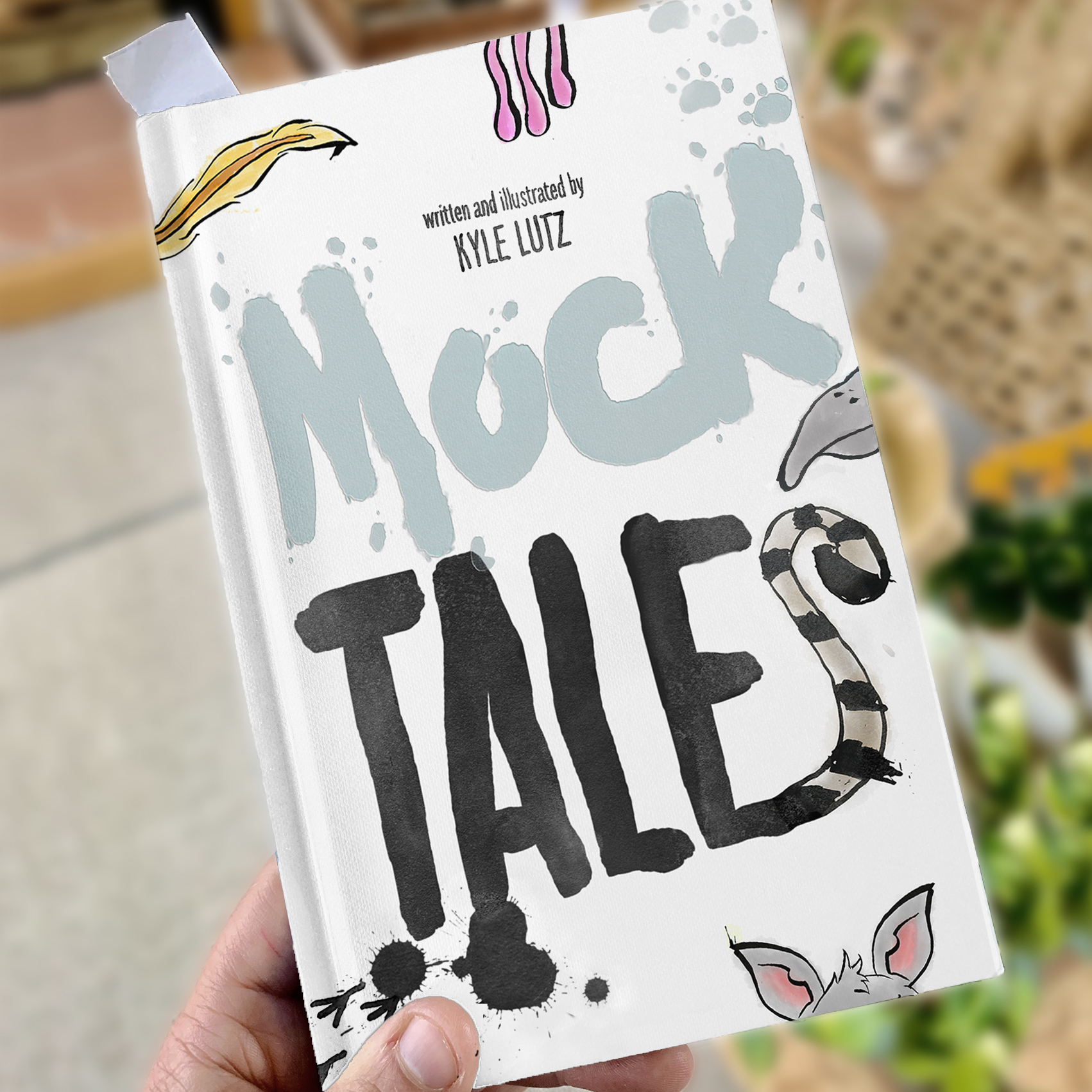 cover mock up Book cover of Muck Tales by Kyle Lutz featuring colorful animal paw prints and illustrations on white background