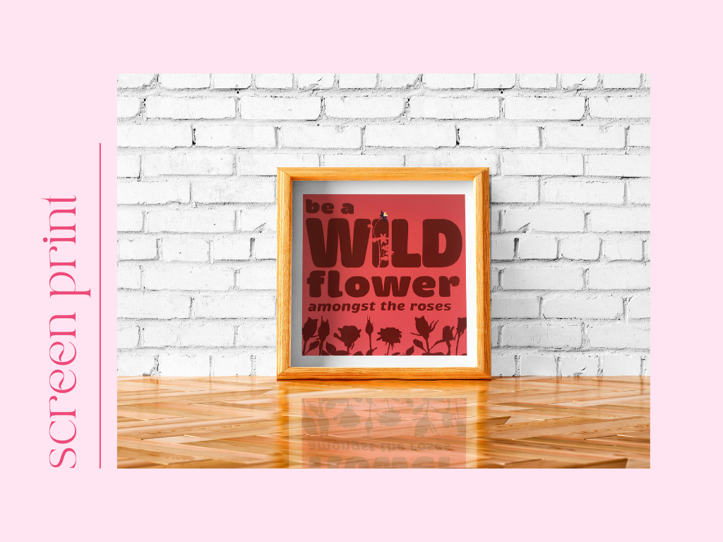 13 Inspirational wall art print in golden frame displaying be a wildflower amongst the roses quote on brick wall
