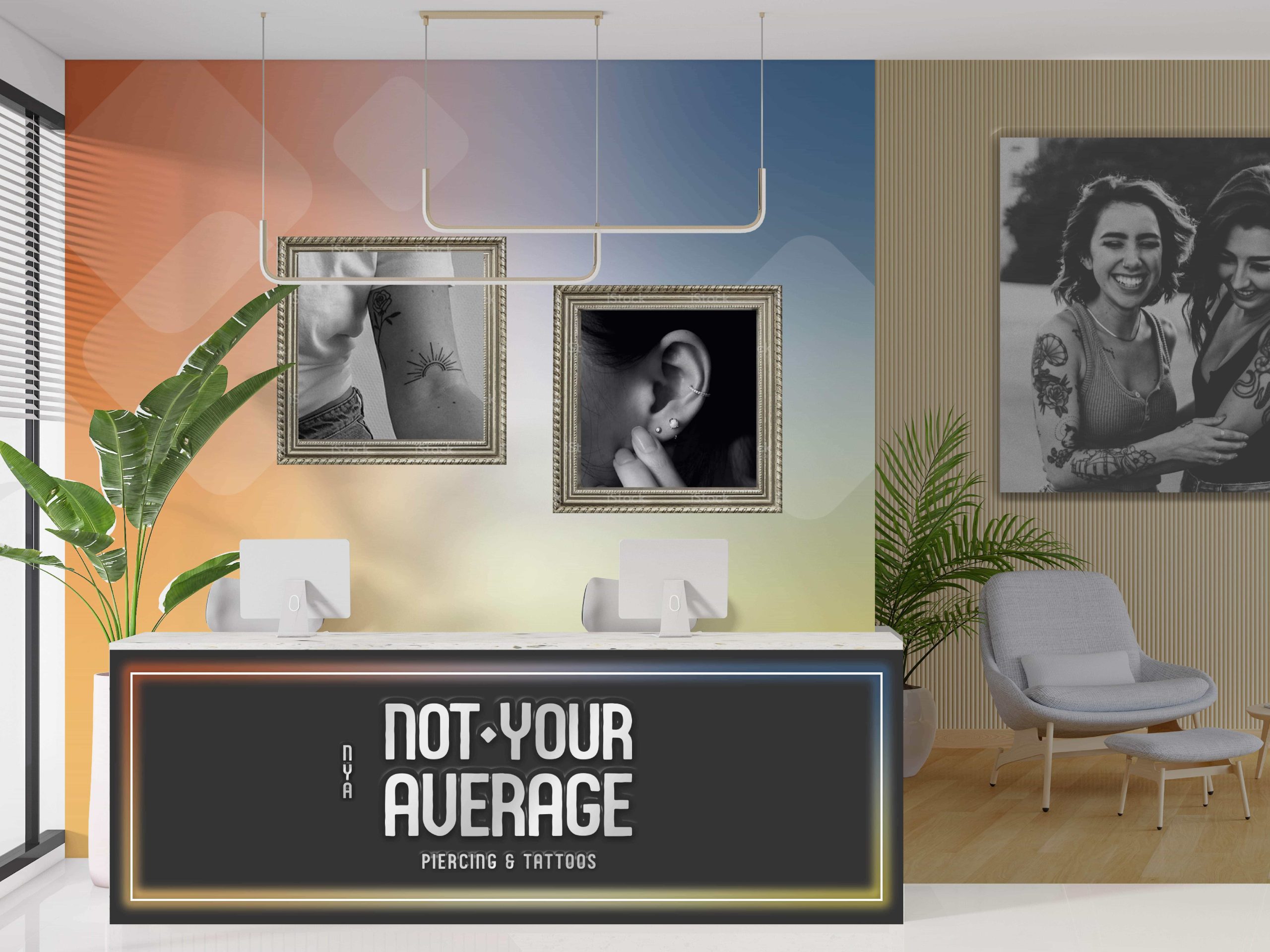 NPowlina_NYA_01 Not Your Average piercing and tattoo studio interior with colorful gradient wall, framed body art photos, and modern decor.